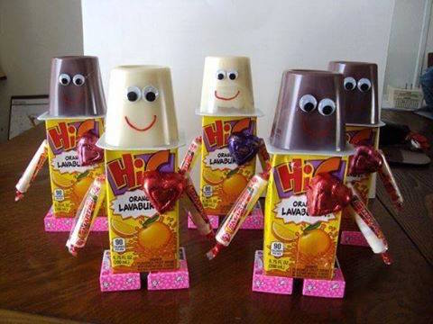 Edible robots made of juice boxes, pudding cups, and googly eyes.